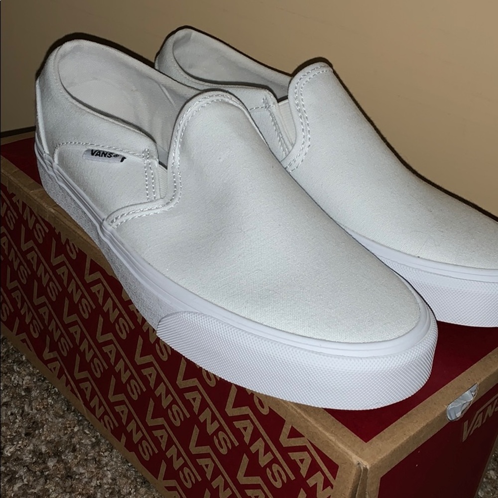 White slip on vans